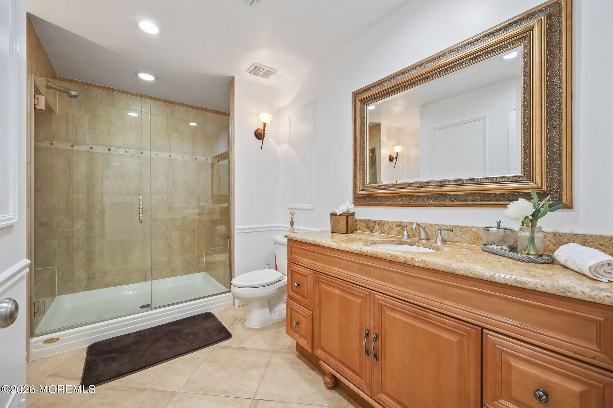 20 Colts Run Marlboro, NJ 07746 - Photo 26 of 44 a bathroom with a sink a toilet and shower