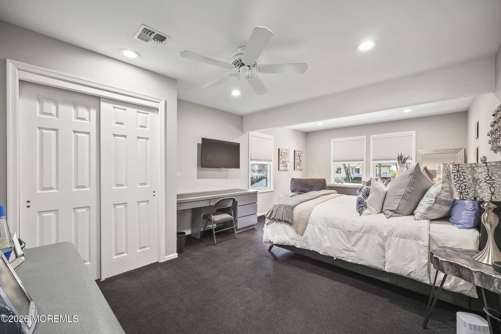 20 Colts Run Marlboro, NJ 07746 - Photo 28 of 44 a spacious bedroom with a bed and a flat screen tv