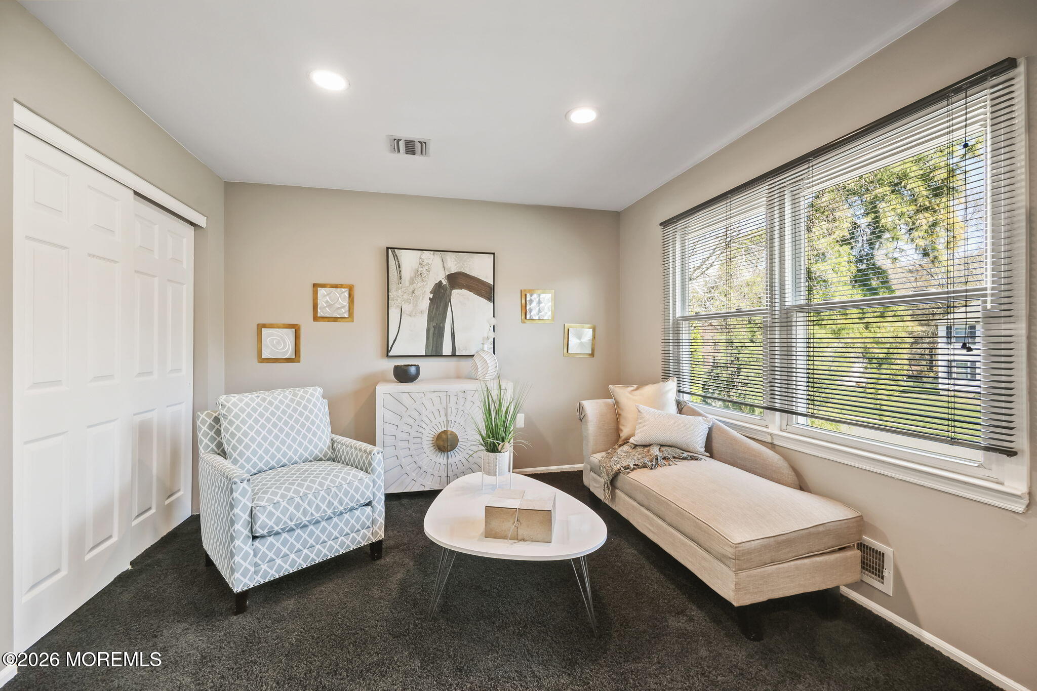20 Colts Run Marlboro, NJ 07746 - Photo 32 of 44 a living room with furniture and a large window