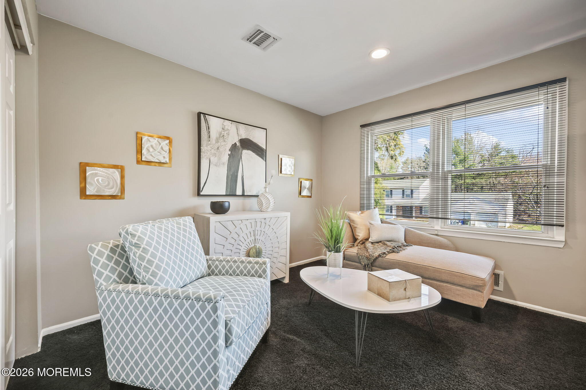 20 Colts Run Marlboro, NJ 07746 - Photo 33 of 44 a living room with furniture and a large window
