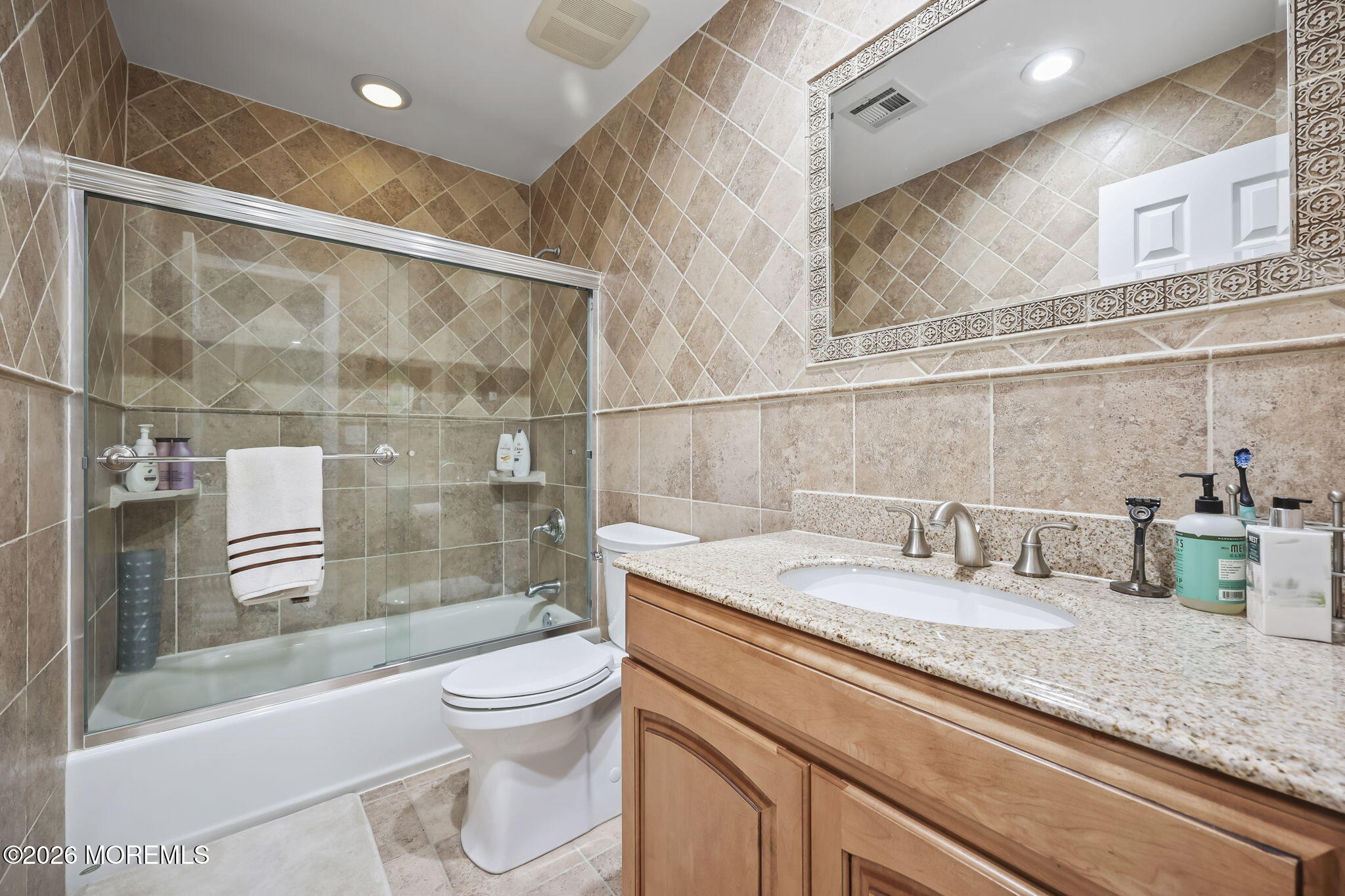 20 Colts Run Marlboro, NJ 07746 - Photo 34 of 44 a bathroom with a granite countertop sink a toilet and shower
