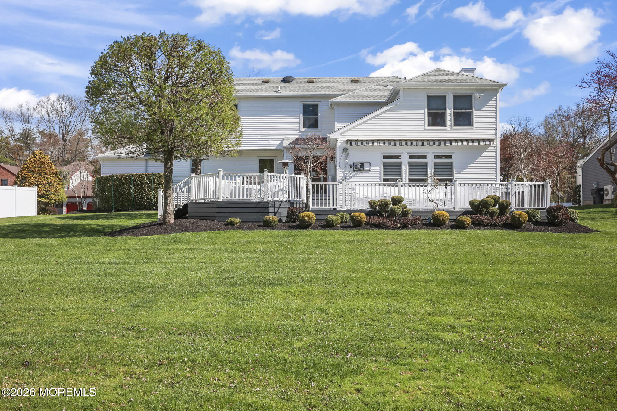 20 Colts Run Marlboro, NJ 07746 - Photo 37 of 44 a front view of a house with a garden