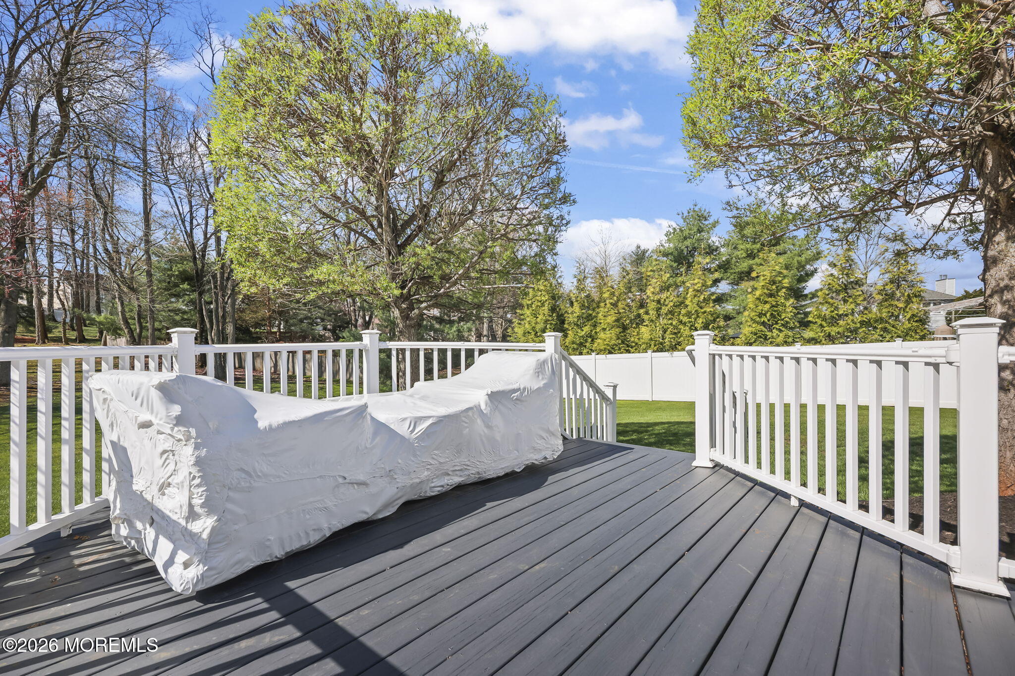 20 Colts Run Marlboro, NJ 07746 - Photo 39 of 44 a view of a wooden deck with trees