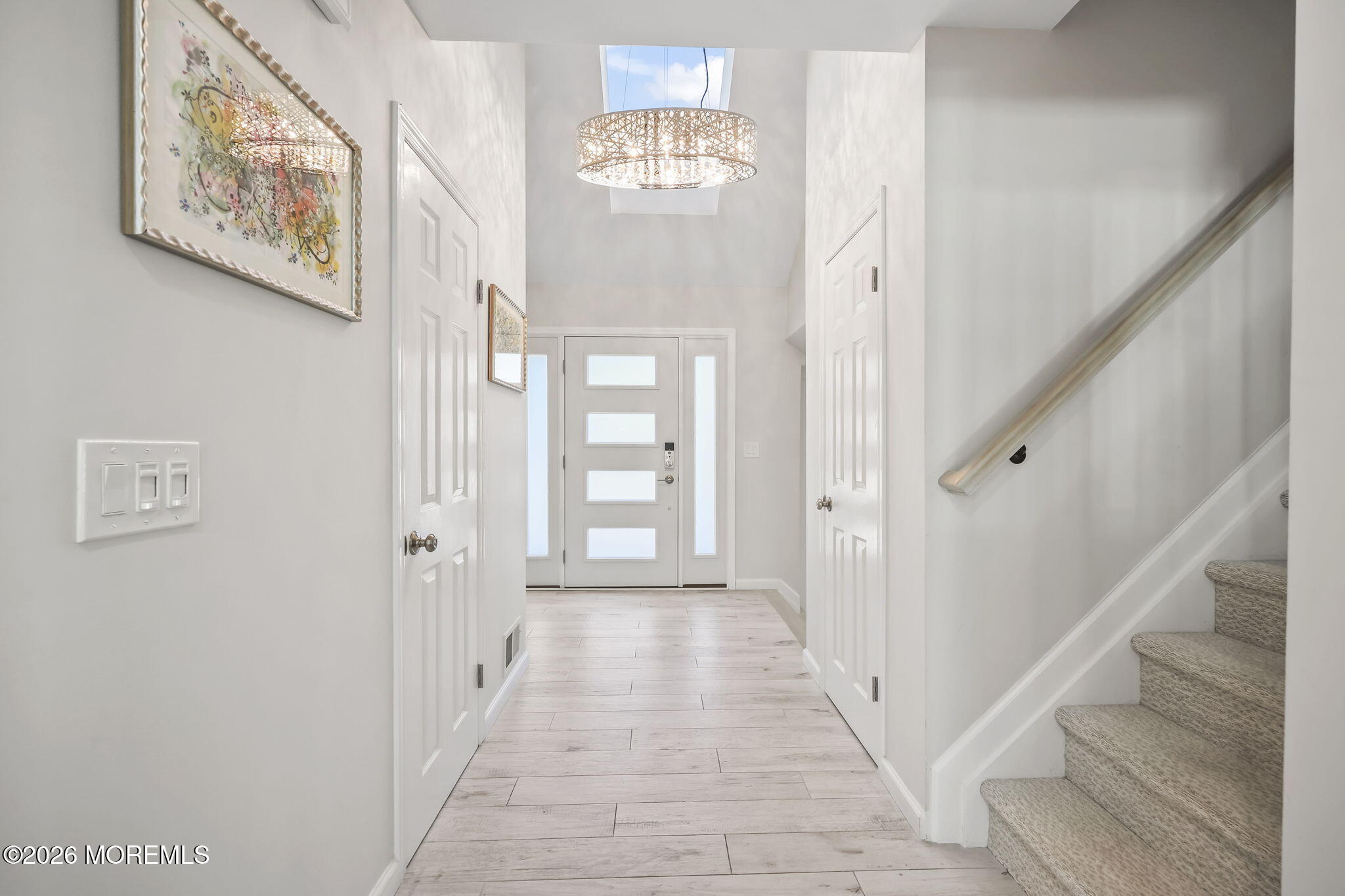 20 Colts Run Marlboro, NJ 07746 - Photo 4 of 44 a view of a hallway with wooden floor and entryway