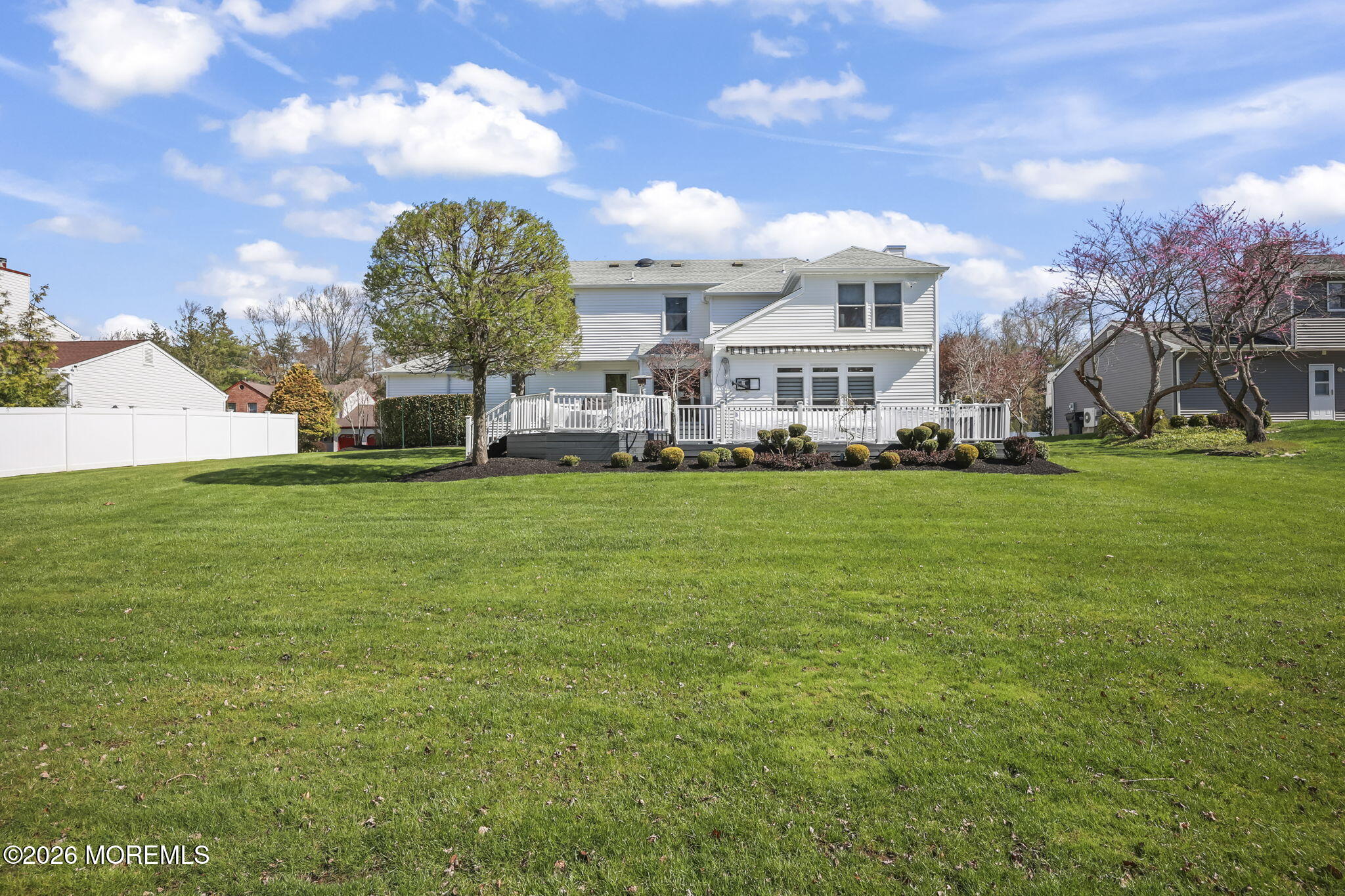 20 Colts Run Marlboro, NJ 07746 - Photo 42 of 44 a view of a house with a big yard and large trees