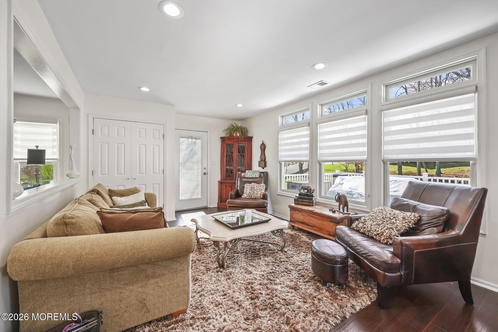 20 Colts Run Marlboro, NJ 07746 - Photo 10 of 44 a living room with furniture and large windows