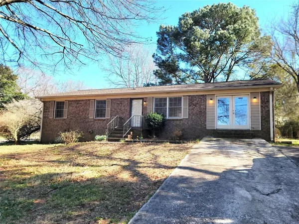 a view of a house with snow on the ground