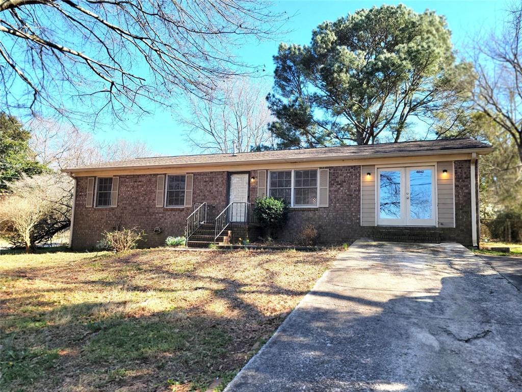 4042 Jodeco Road McDonough, GA 30253 - Photo 14 of 16 a view of a house with snow on the ground