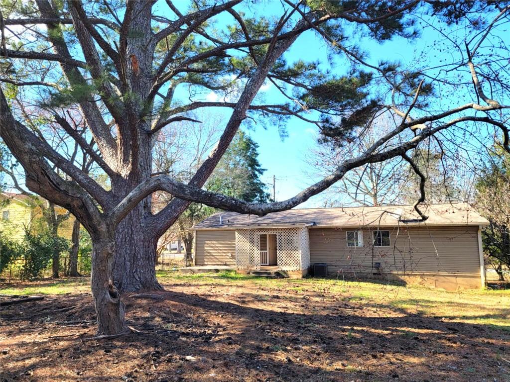 4042 Jodeco Road McDonough, GA 30253 - Photo 15 of 16 a view of a house with a yard