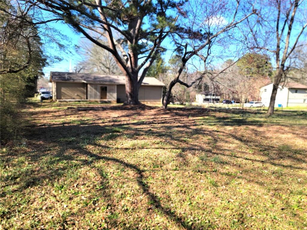 4042 Jodeco Road McDonough, GA 30253 - Photo 16 of 16 a view of a yard with a tree