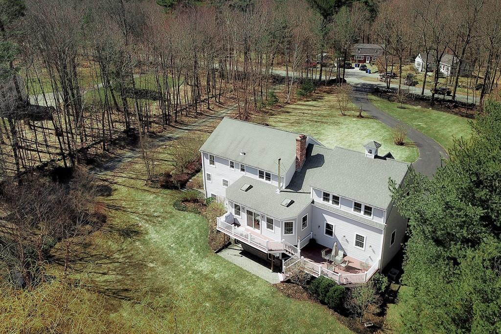 51 Parker Road Shirley, MA 01464 - Photo 3 of 39 an aerial view of a house with swimming pool and large trees