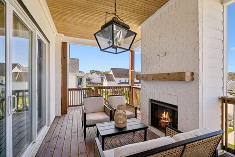 a view of a couches in the balcony