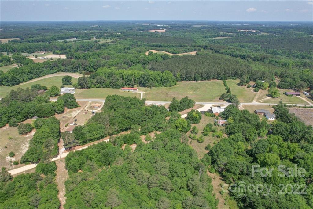 1635 State Rd S-13-61 Cheraw, SC 29520 - Photo 3 of 13 a view of a lake with a city
