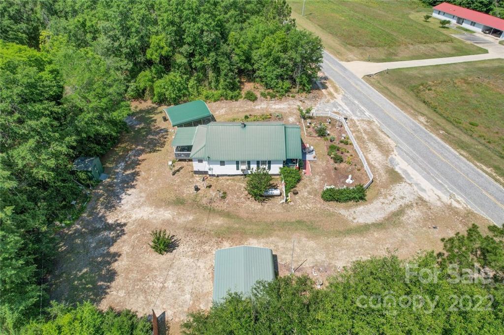 1635 State Rd S-13-61 Cheraw, SC 29520 - Photo 5 of 13 an aerial view of a house with outdoor space