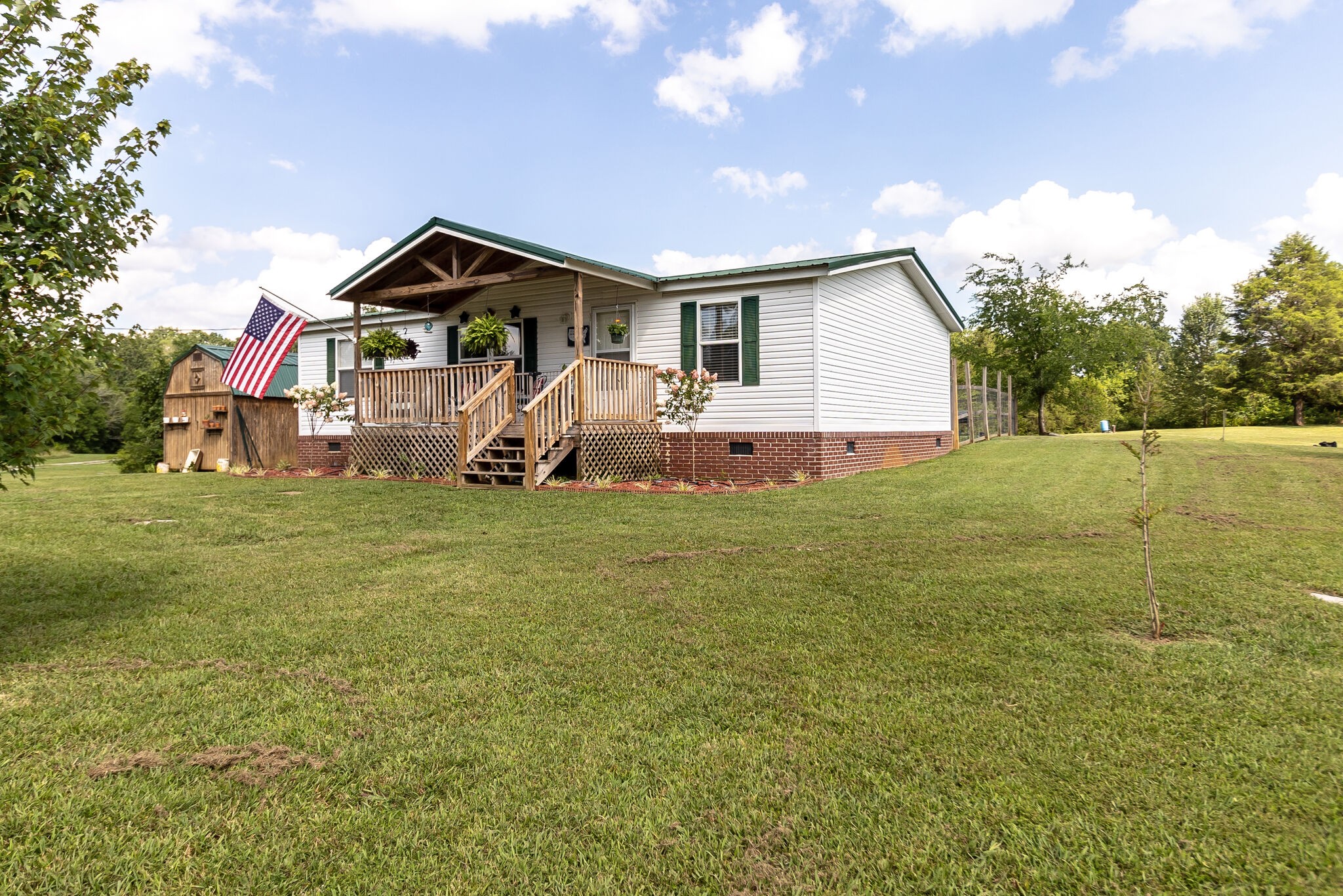 2865 Carpenter Bridge Road Columbia, TN 38401 - Photo 1 of 25 a view of a house with a yard and sitting area