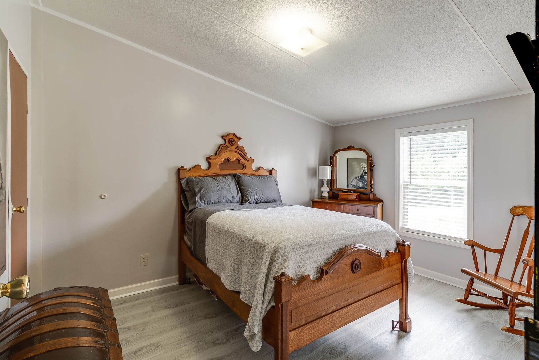 2865 Carpenter Bridge Road Columbia, TN 38401 - Photo 22 of 25 a bedroom with a bed and a chair
