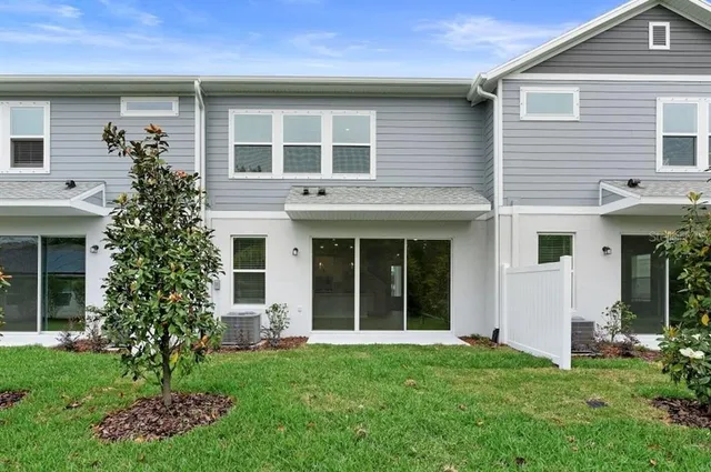 front view of a house with a yard