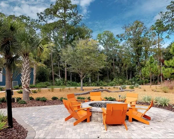 a view of backyard with swimming pool