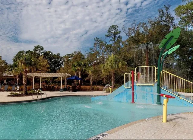 a view of a park with swings