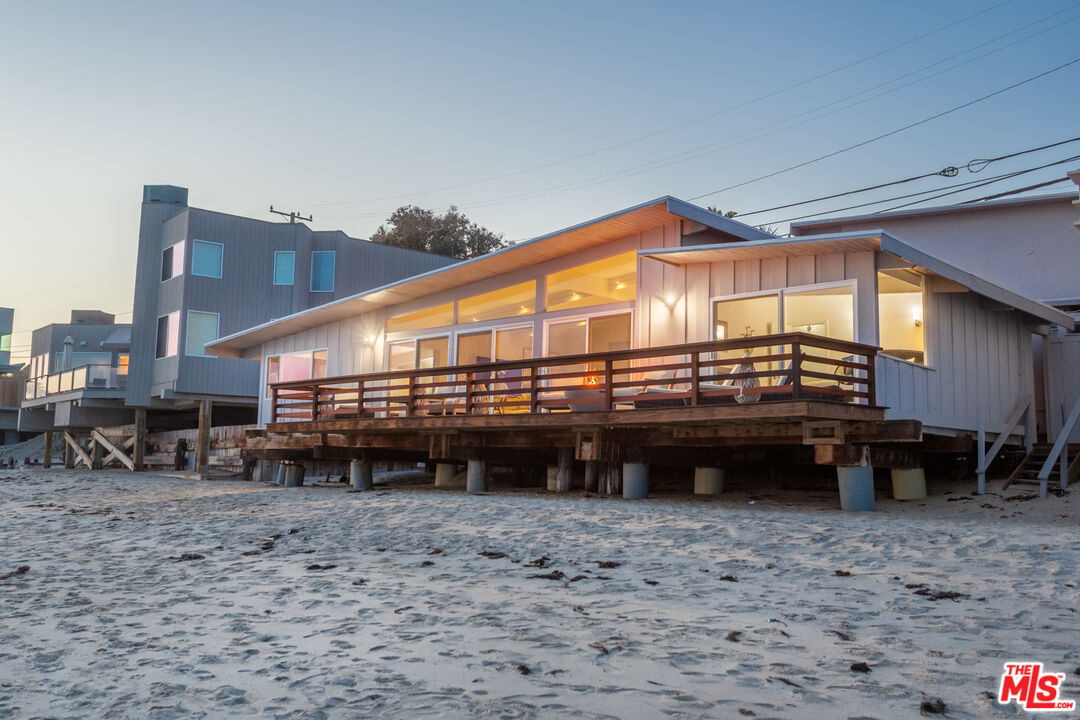24246 Malibu Road Malibu, CA 90265 - Photo 15 of 20 a view of a house with a yard