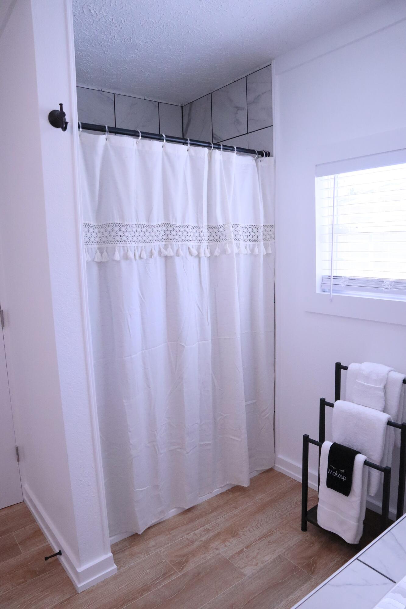 4608 Falcon Way Crestview, FL 32539 - Photo 20 of 42 a view of a room with window and hardwood floor