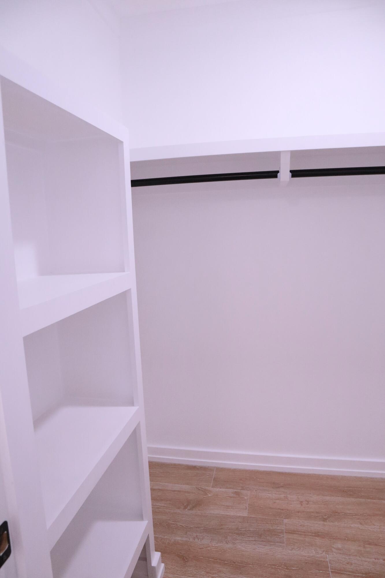 4608 Falcon Way Crestview, FL 32539 - Photo 23 of 42 a view of walk in closet with clothes