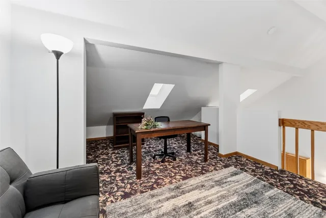 a view of balcony with furniture