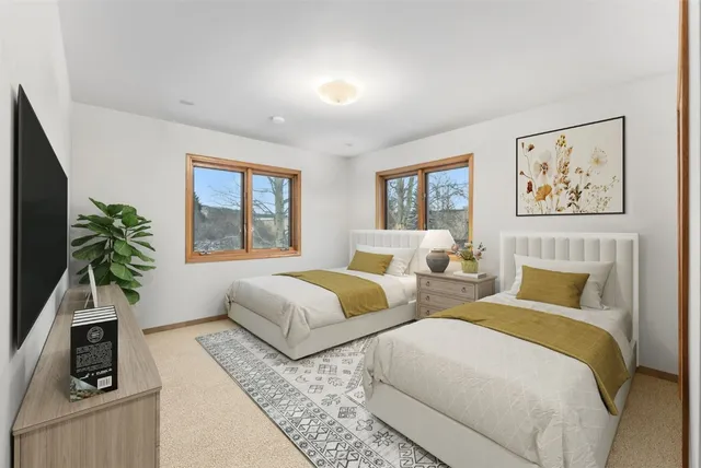 a bathroom with a glass shower door and mirror