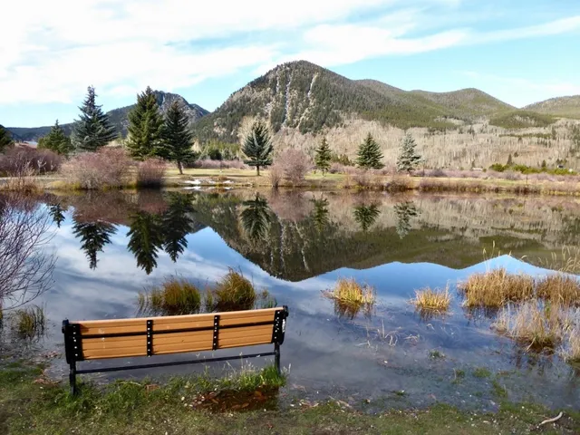 a view of a street with shops