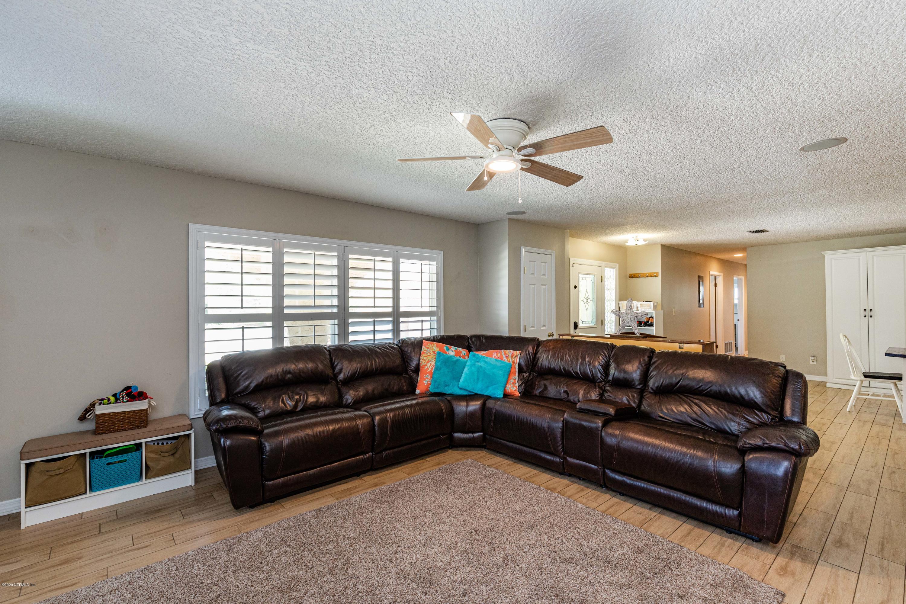 56 Solana Road Ponte Vedra Beach, FL 32082 - Photo 19 of 47 a living room with furniture and a window