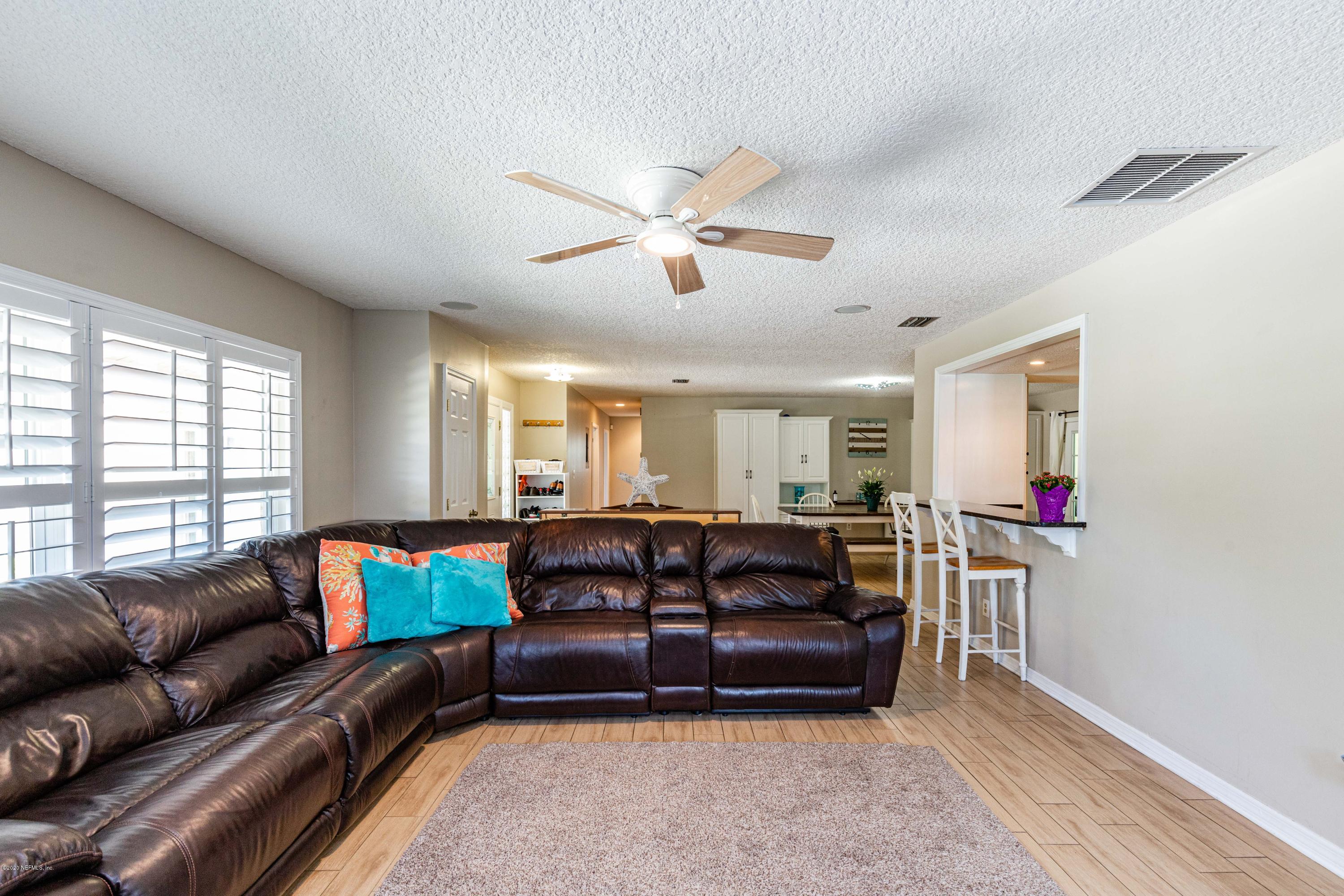 56 Solana Road Ponte Vedra Beach, FL 32082 - Photo 20 of 47 a living room with furniture and a window