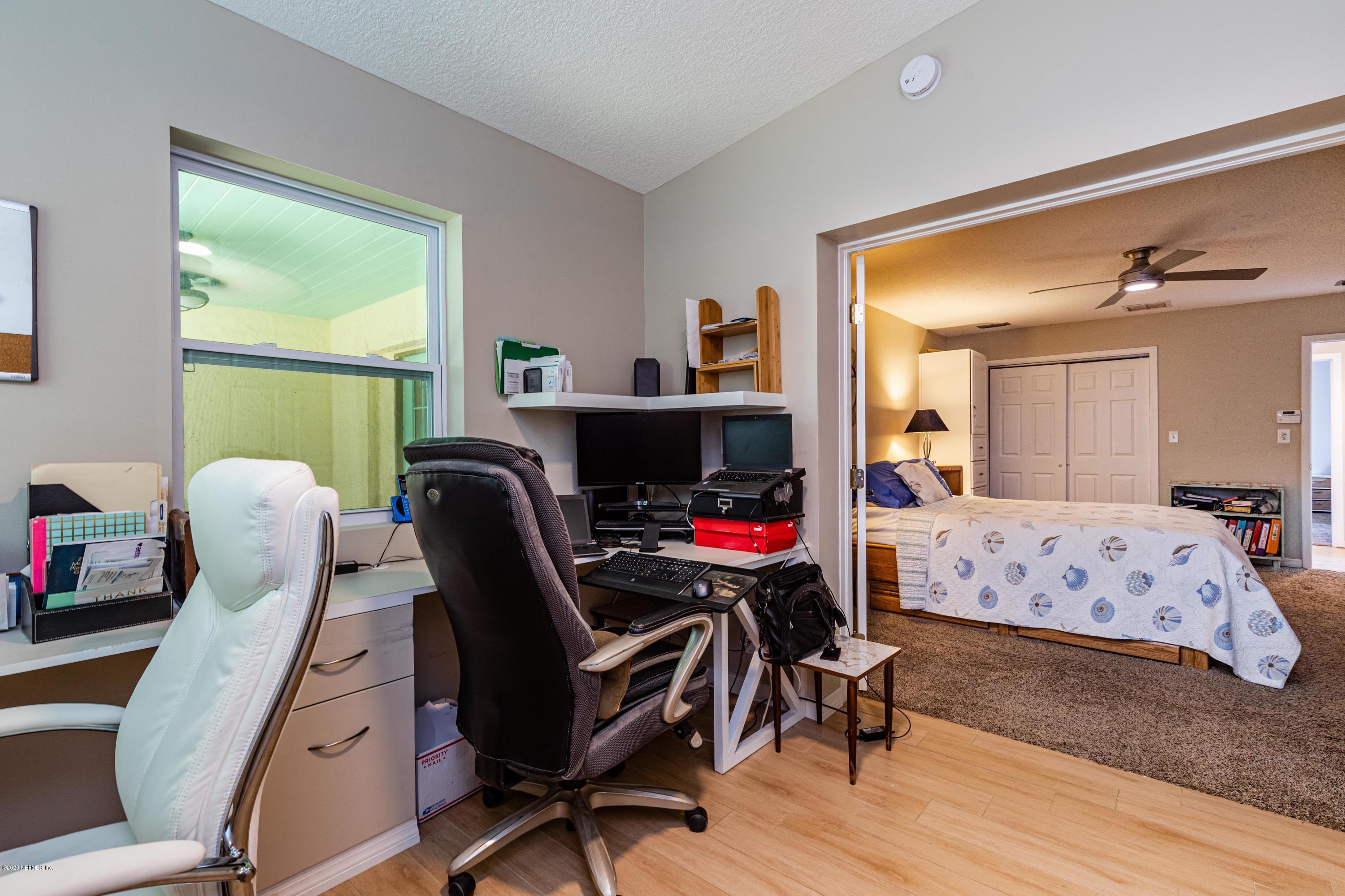 56 Solana Road Ponte Vedra Beach, FL 32082 - Photo 26 of 47 a bedroom with furniture and a window