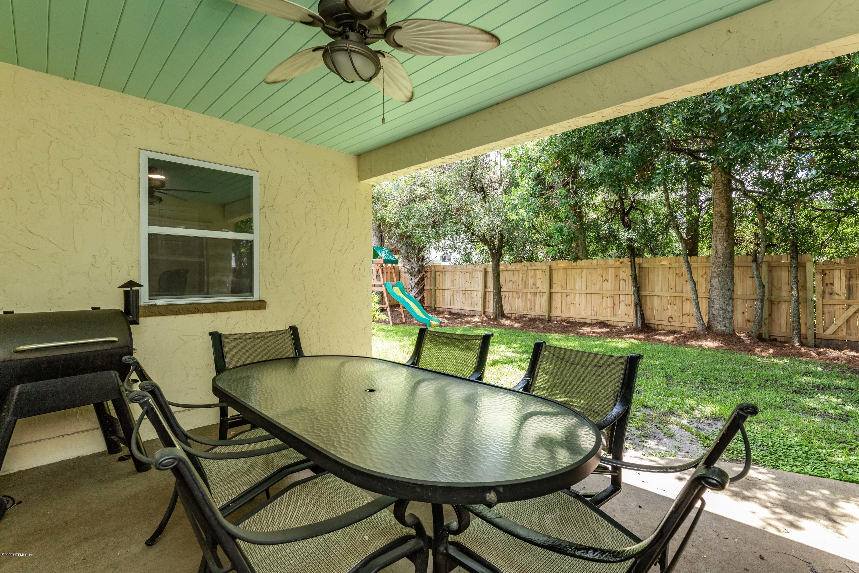 56 Solana Road Ponte Vedra Beach, FL 32082 - Photo 35 of 47 a balcony with table and chairs
