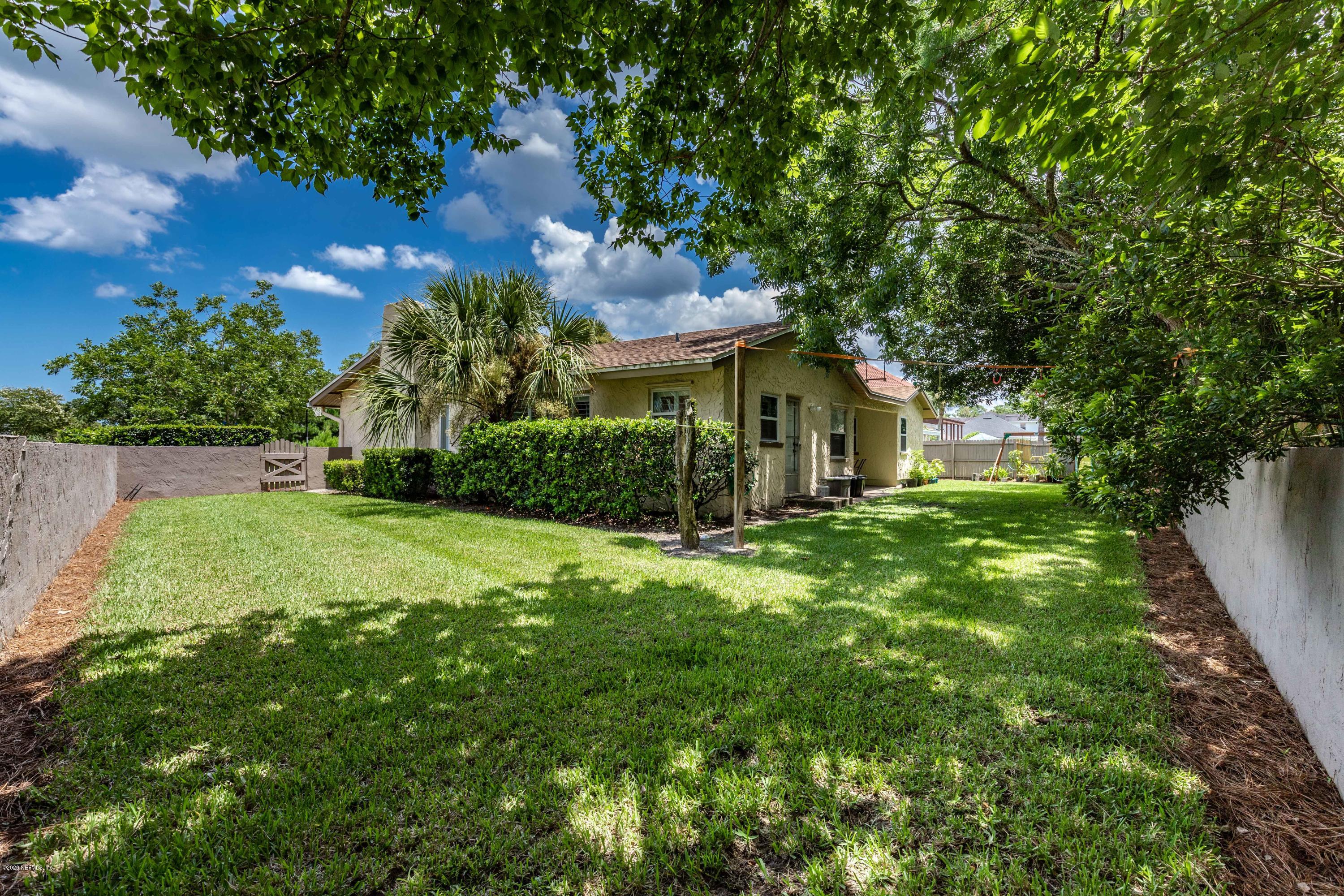 56 Solana Road Ponte Vedra Beach, FL 32082 - Photo 36 of 47 a view of a house with a yard