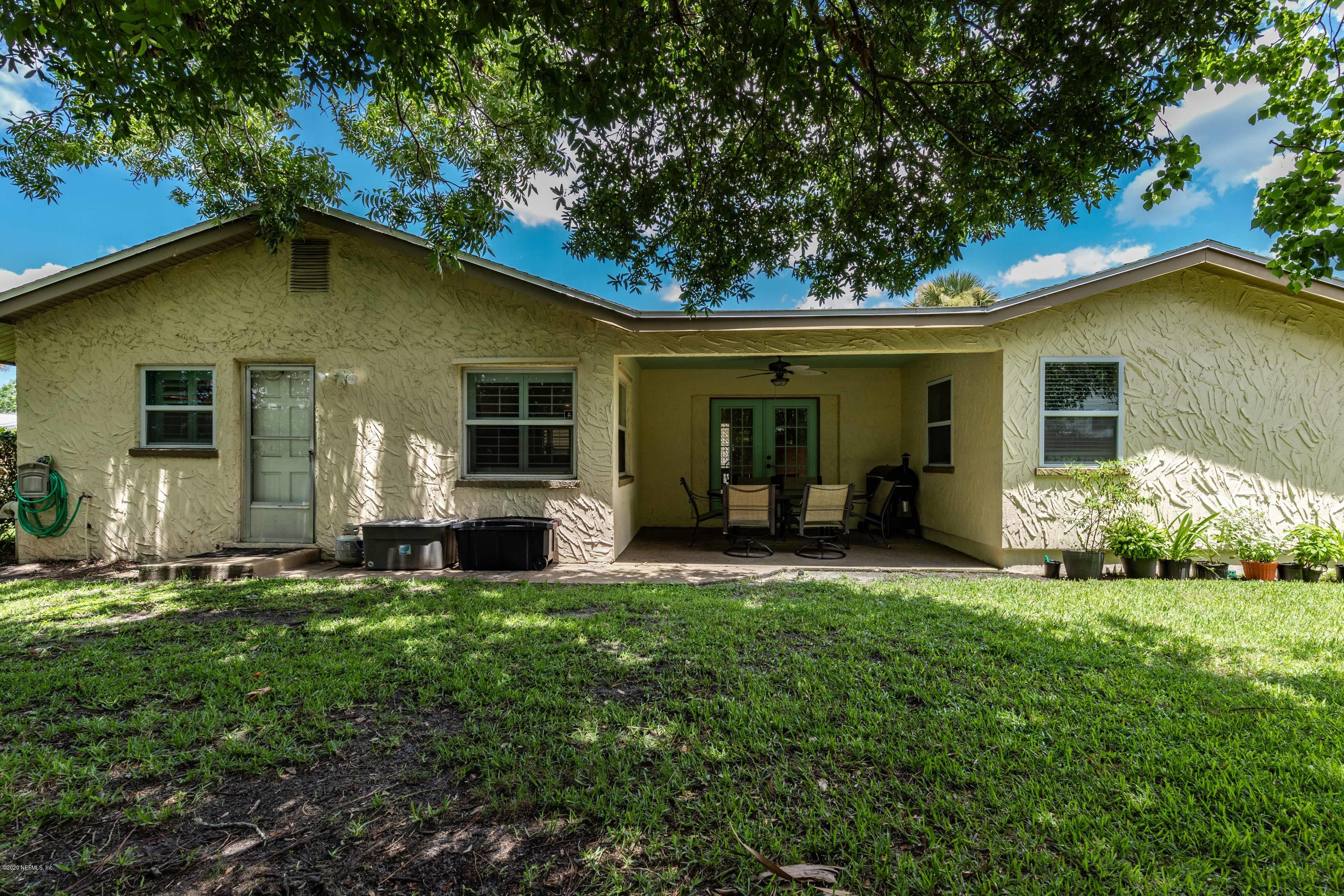 56 Solana Road Ponte Vedra Beach, FL 32082 - Photo 37 of 47 a view of a house with a yard