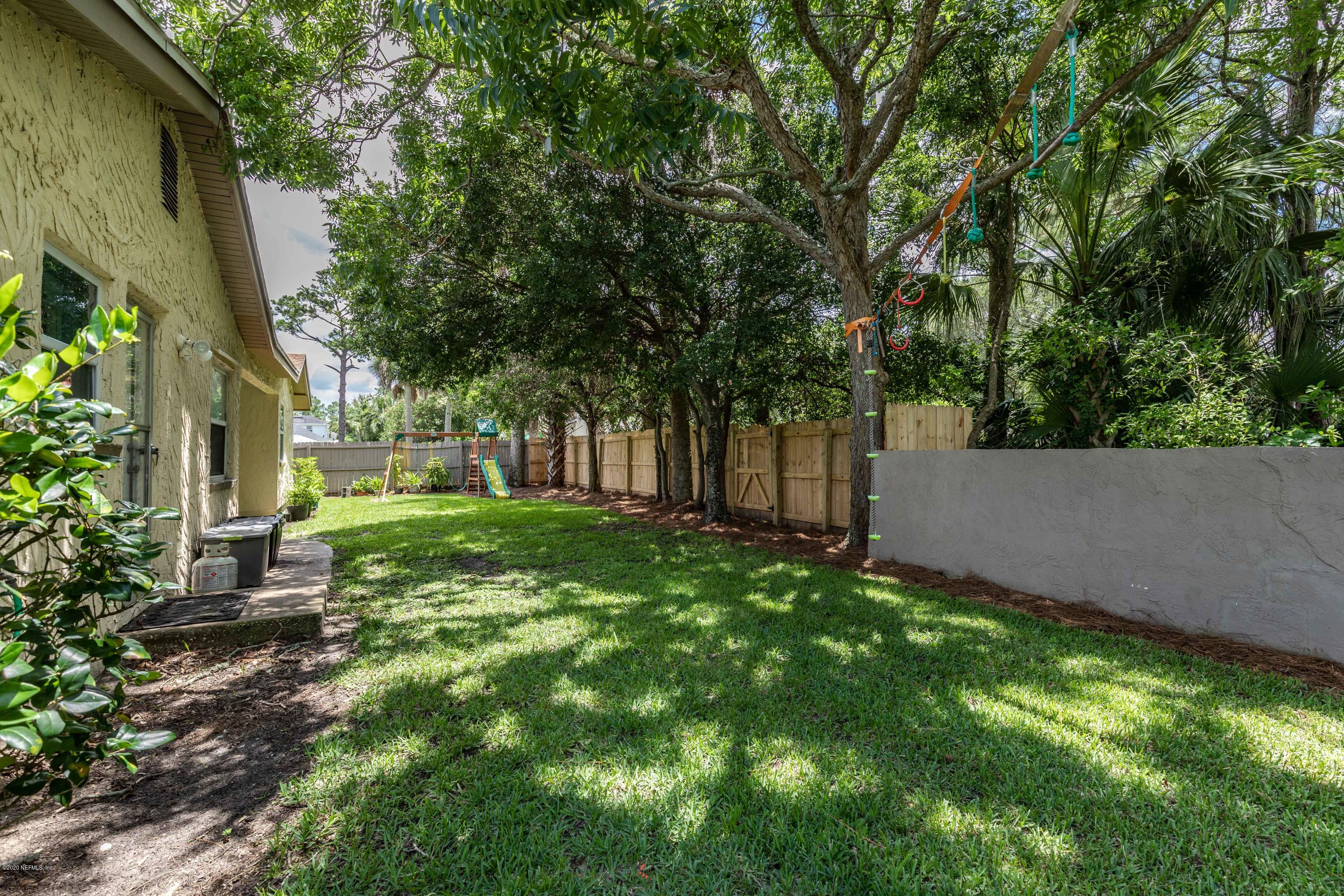 56 Solana Road Ponte Vedra Beach, FL 32082 - Photo 39 of 47 a view of a house with a backyard