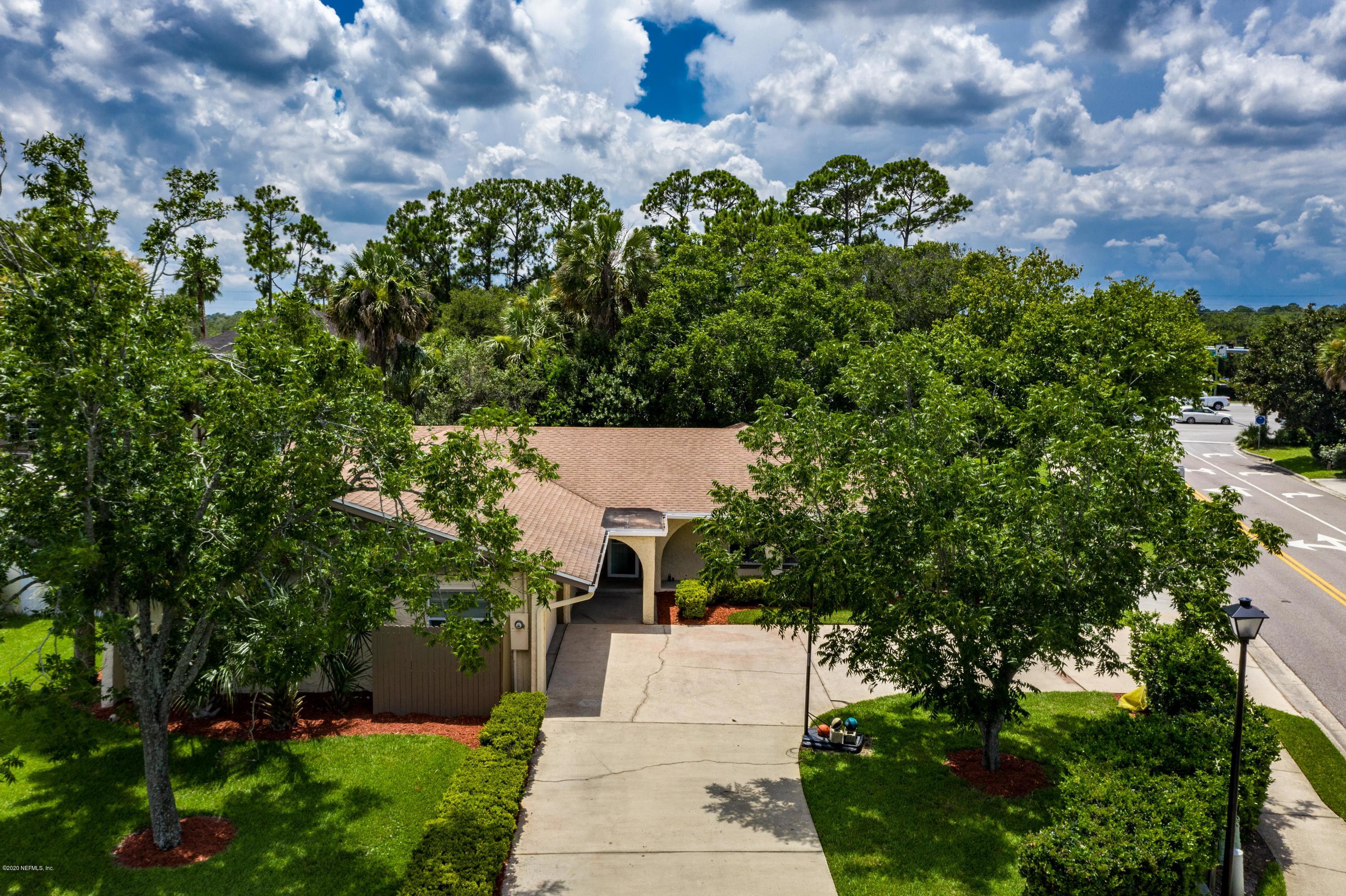 56 Solana Road Ponte Vedra Beach, FL 32082 - Photo 40 of 47 an aerial view of a house with a garden