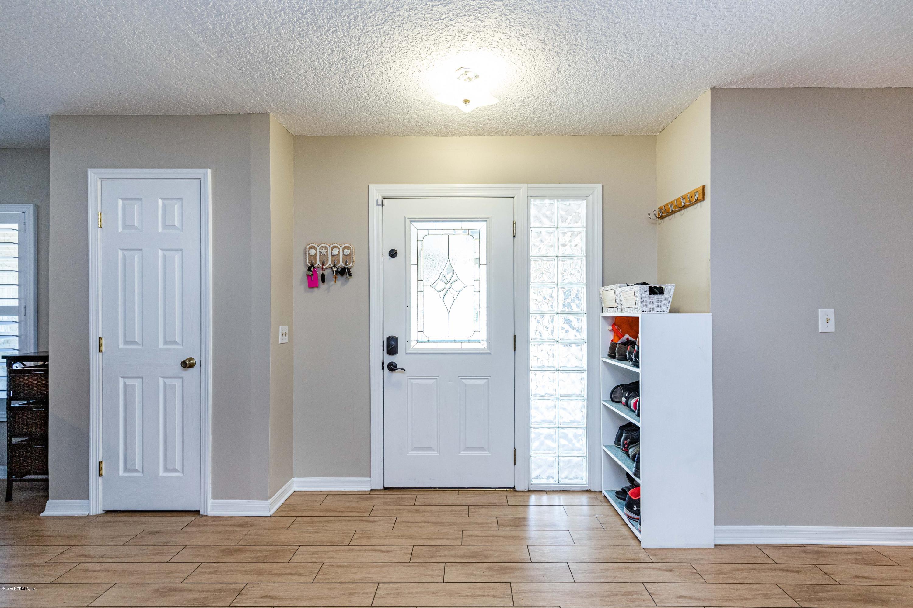 56 Solana Road Ponte Vedra Beach, FL 32082 - Photo 4 of 47 wooden floor in an empty room