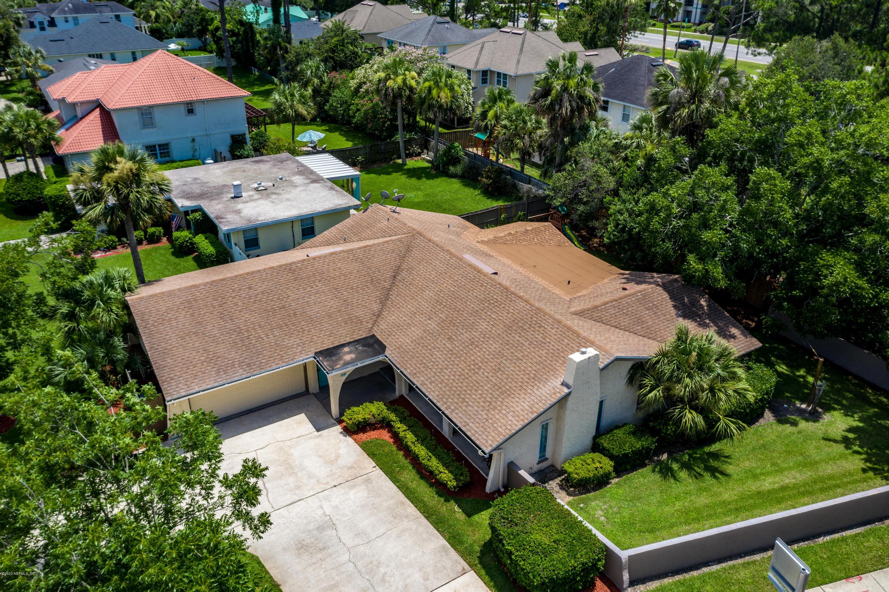 56 Solana Road Ponte Vedra Beach, FL 32082 - Photo 41 of 47 an aerial view of a house with yard and outdoor seating
