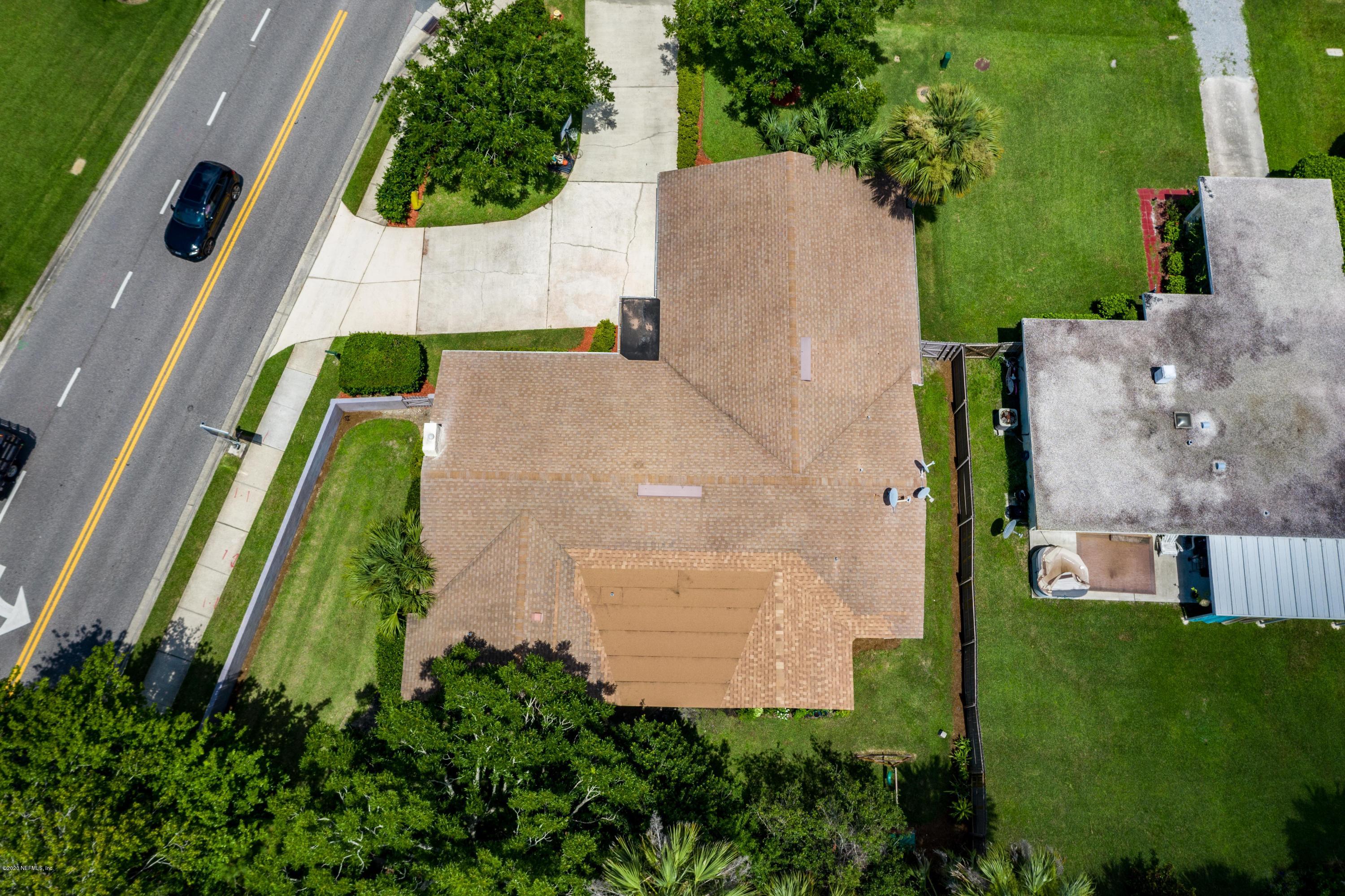 56 Solana Road Ponte Vedra Beach, FL 32082 - Photo 43 of 47 an aerial view of a house with a yard
