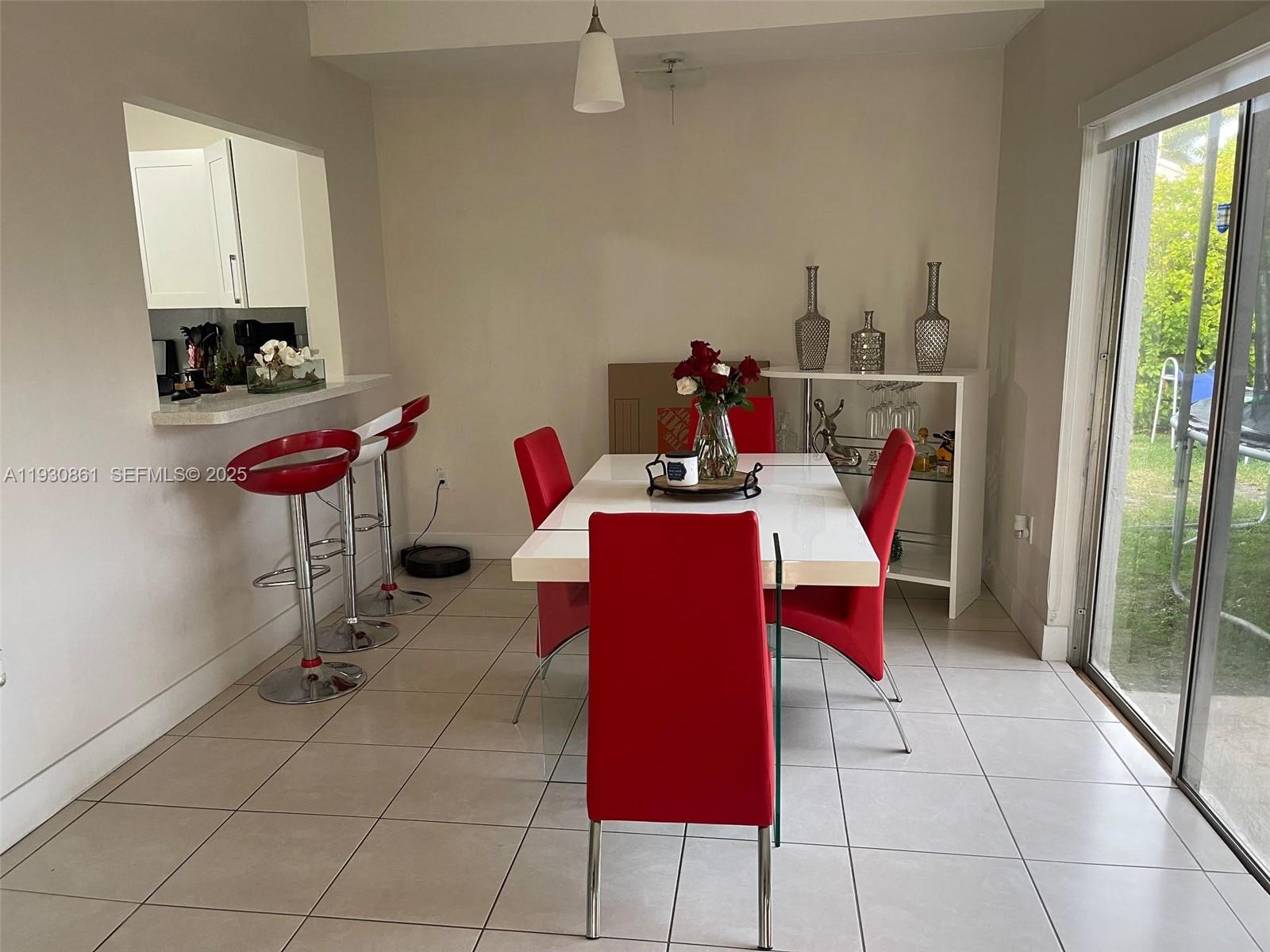 20420 Southwest 124th Place, Unit 20420 Miami, FL 33177 - Photo 6 of 16 a view of a workspace with furniture