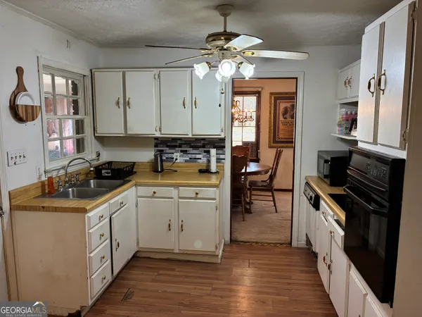 a room with furniture and a window