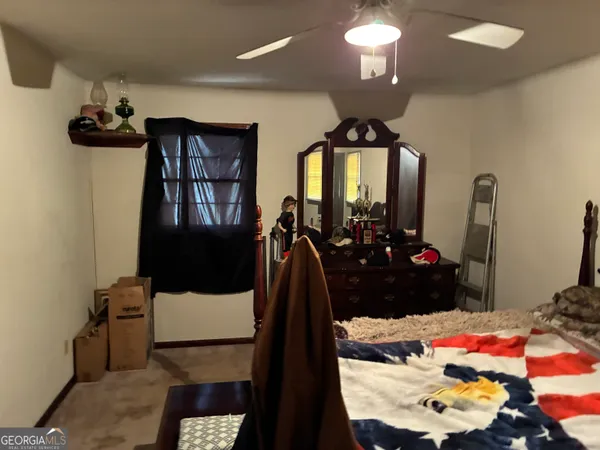 a view of a back yard of the house