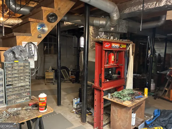 a front view of a house with parking space