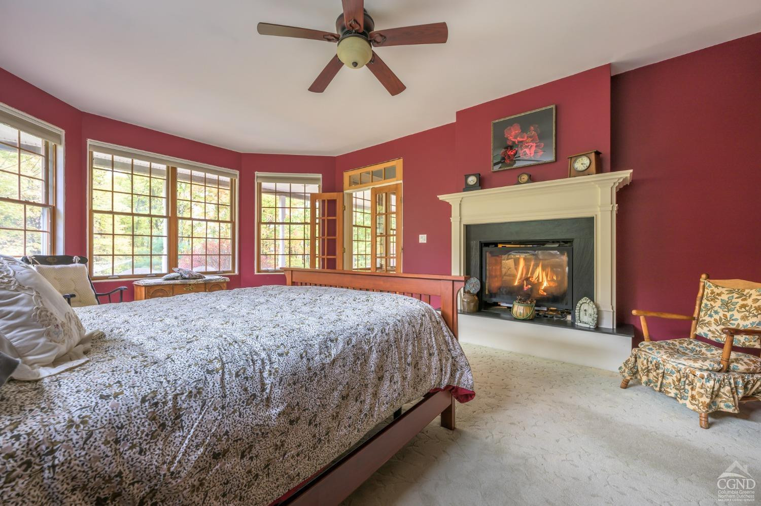 1013 Plank Road Poestenkill, NY 12018 - Photo 11 of 49 a bedroom with a bed and a fireplace