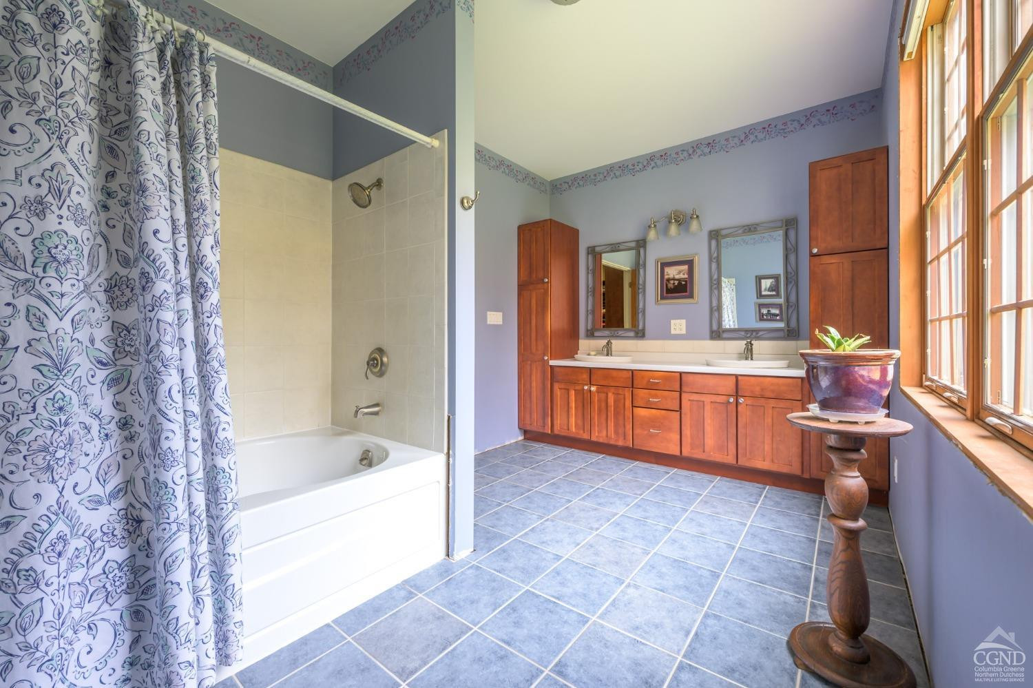 1013 Plank Road Poestenkill, NY 12018 - Photo 13 of 49 a bathroom with a tub sink and mirror