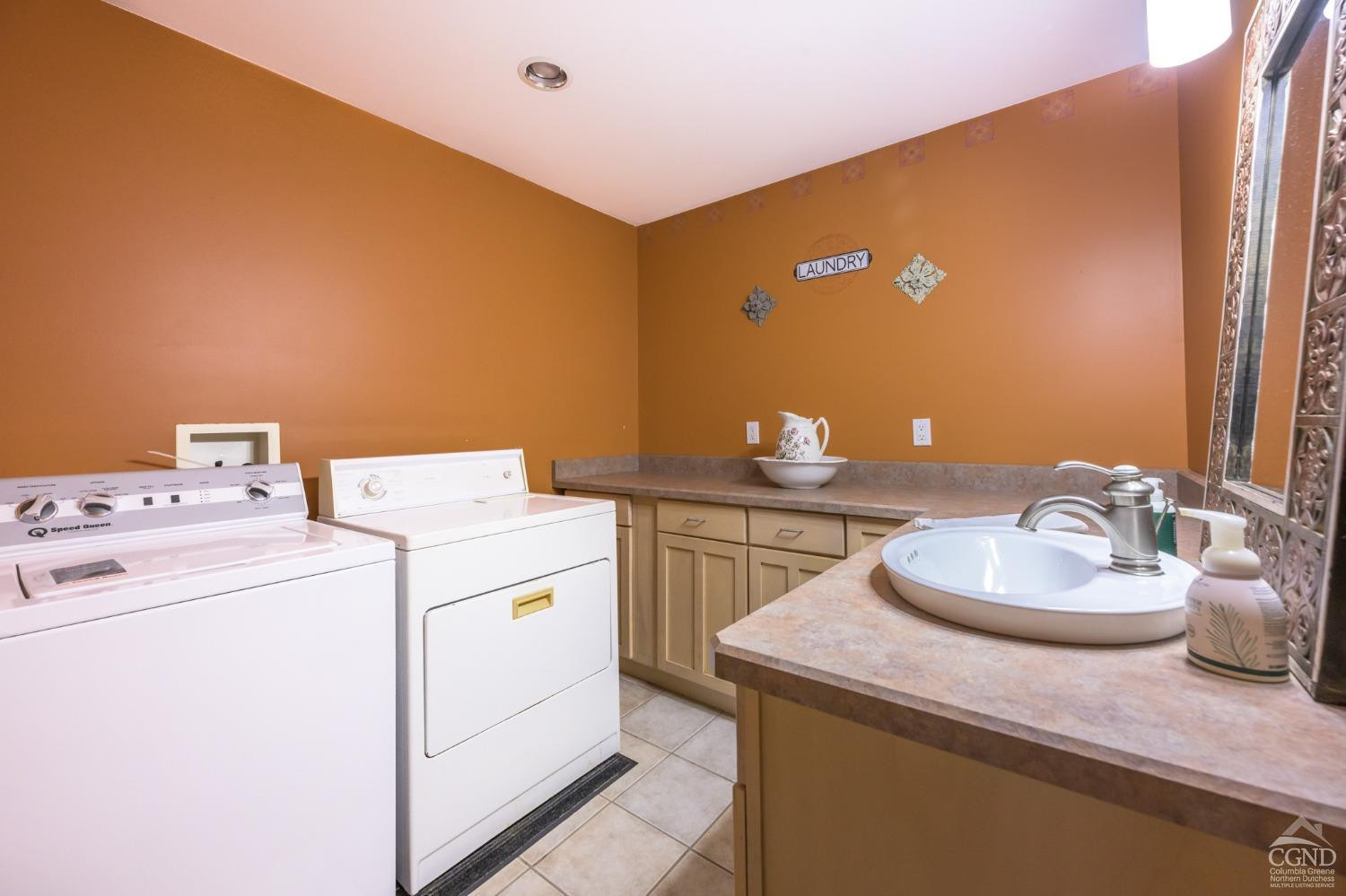 1013 Plank Road Poestenkill, NY 12018 - Photo 14 of 49 a utility room with dryer and washer