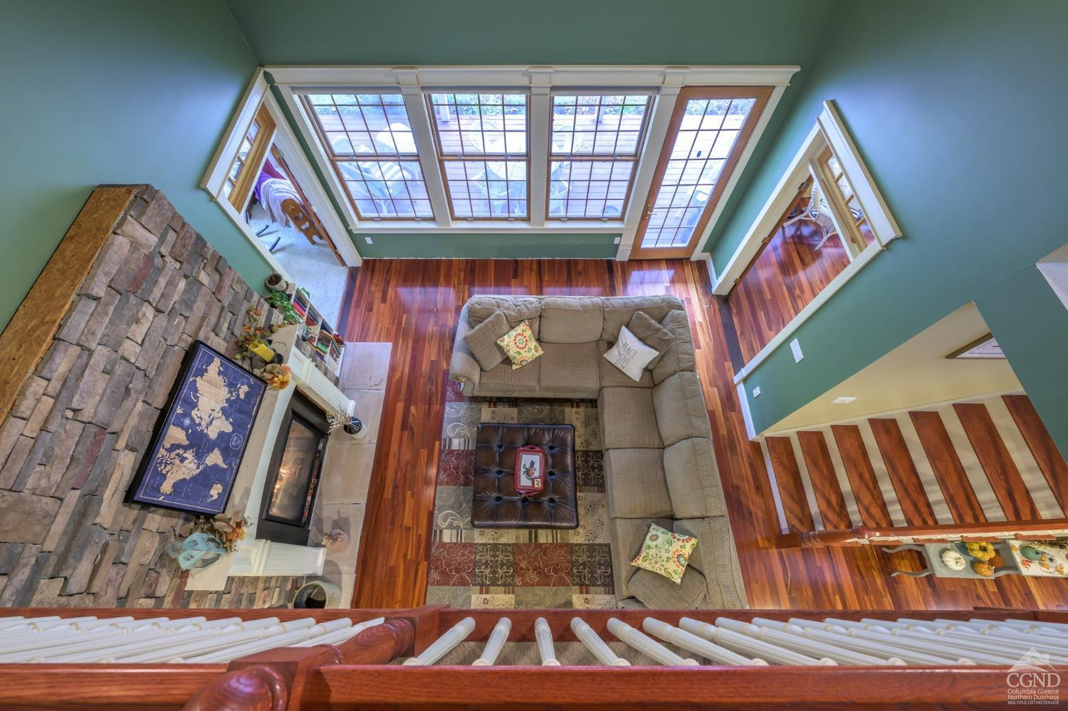 1013 Plank Road Poestenkill, NY 12018 - Photo 16 of 49 a living room with furniture and a fireplace