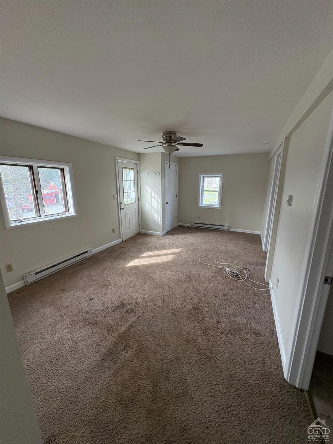 1013 Plank Road Poestenkill, NY 12018 - Photo 36 of 49 a view of a big room with windows and chandelier fan