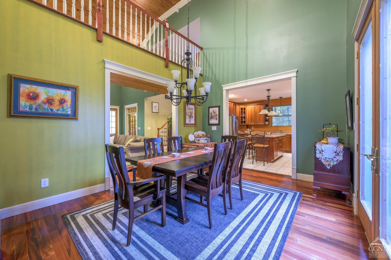 1013 Plank Road Poestenkill, NY 12018 - Photo 8 of 49 a view of a dining room with furniture window and wooden floor